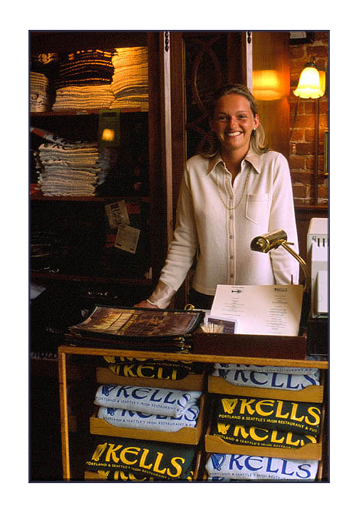 Hostess with a Welcoming Greeting. Kells Restaurant Portland.  High Cascade Studios.